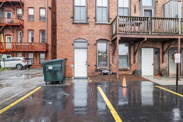a cars parked in front of a building