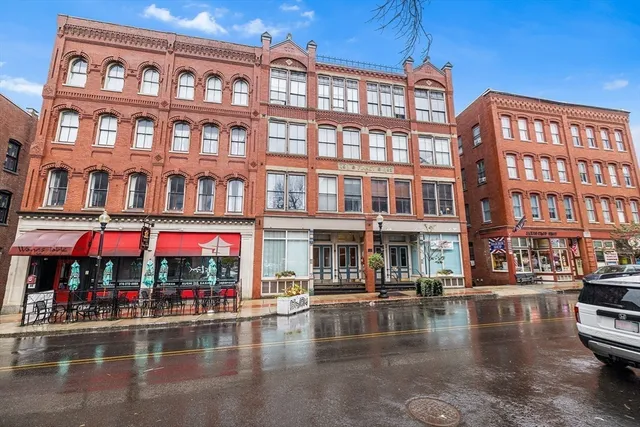 a view of a balcony with wooden floor and outdoor space