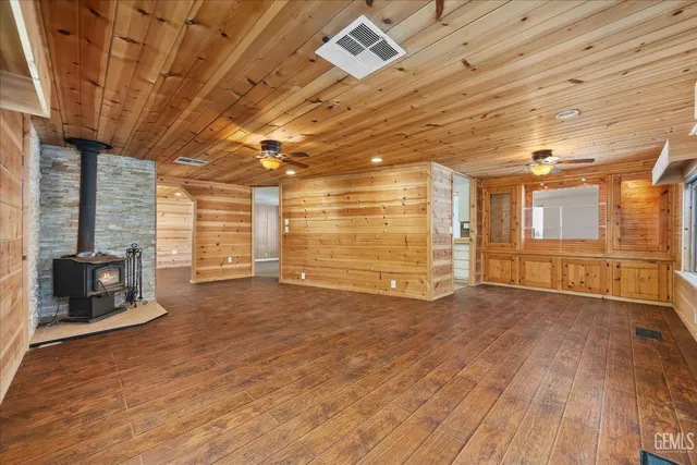 a view of a livingroom with furniture and wooden floor