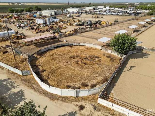 an aerial view of ocean and residential houses