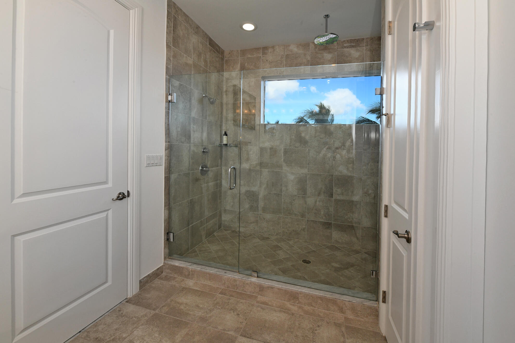 100 Northwest 69th Circle, Unit 68 Boca Raton, FL 33487 - Photo 24 of 49 Primary Bath Shower