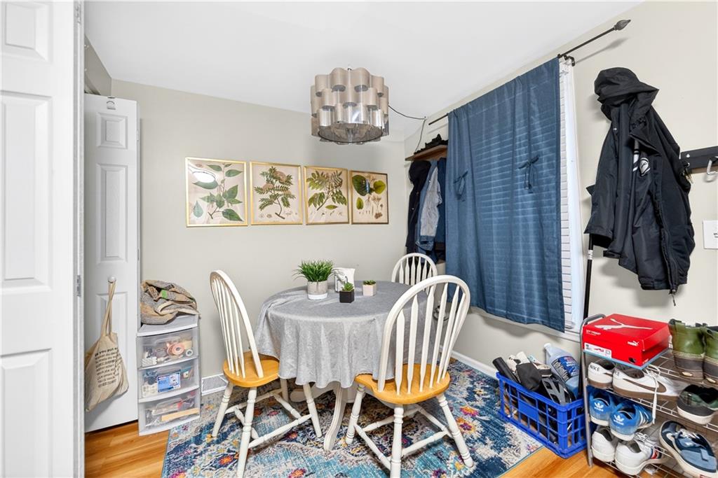 708 Seavey Road Pittsburgh, PA 15209 - Photo 7 of 29 1st Flr Dining area off the kitchen. Laundry located behind the bifold doors.