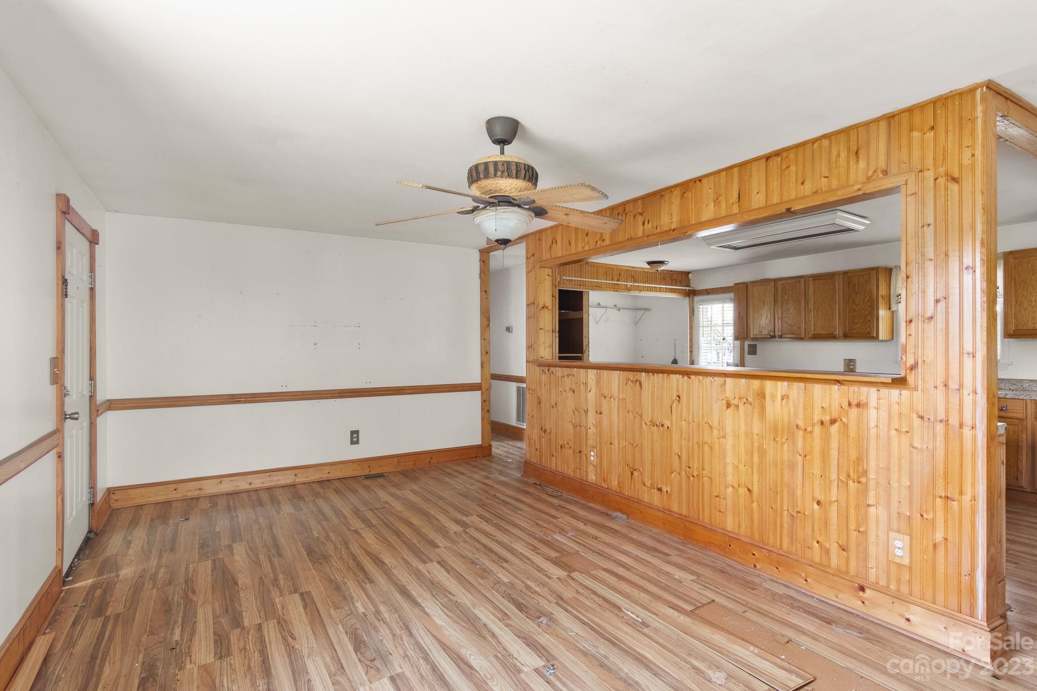 716 Robin Avenue Kannapolis, NC 28081 - Photo 16 of 25 a view of empty room with wooden floor