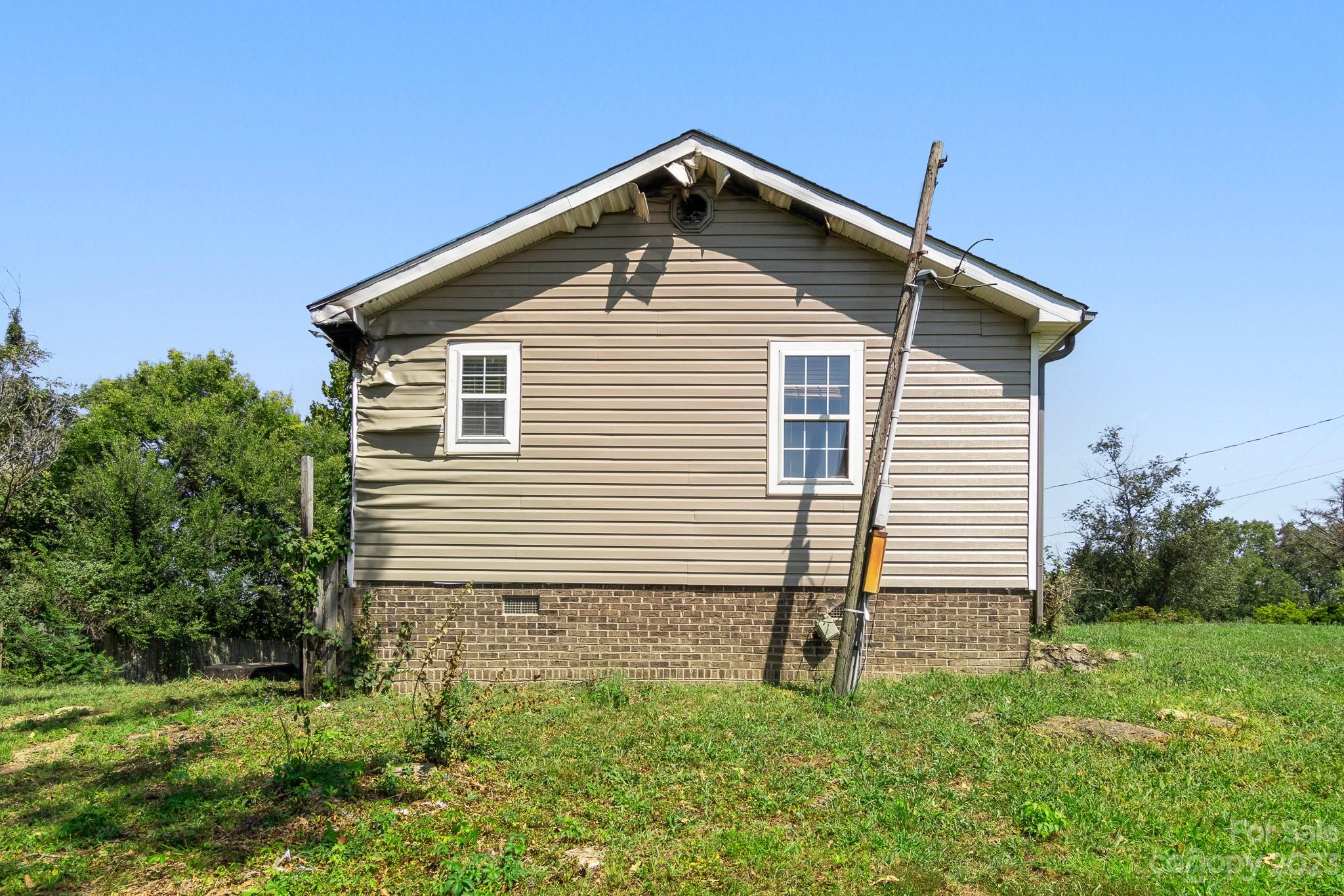 716 Robin Avenue Kannapolis, NC 28081 - Photo 3 of 25 a front view of a house with a yard