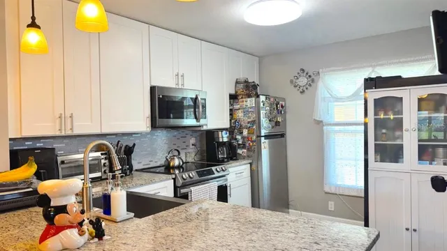 $242,000 | 13840 Timberbrooke Drive, Unit 103, Orlando, FL 32824