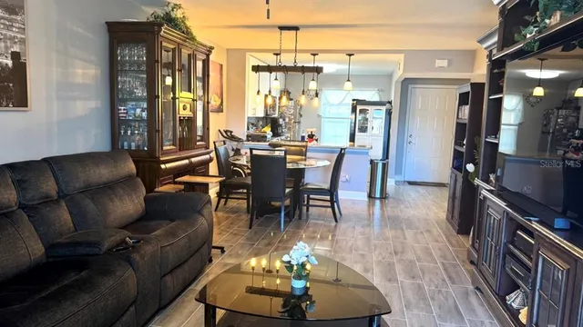 $242,000 | 13840 Timberbrooke Drive, Unit 103, Orlando, FL 32824