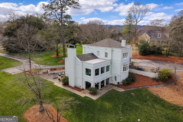 a view of a house with a big yard