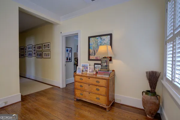 a bedroom with a bed and a walk in closet
