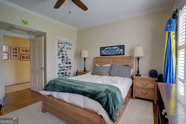 a room with furniture a flat screen tv and a table