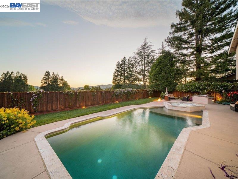 17 Suva Court San Ramon, CA 94582 - Photo 39 of 47 a view of a swimming pool with a yard