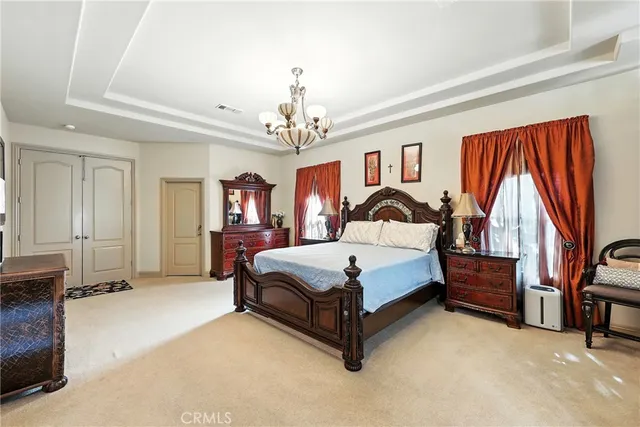 a kitchen with a sink and a refrigerator