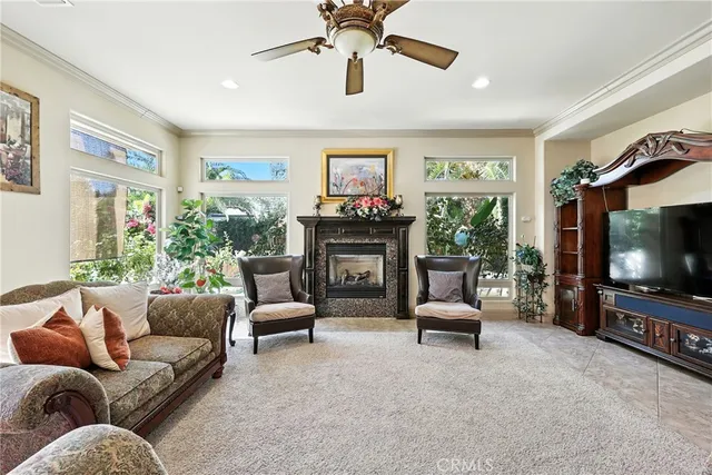 a view of a livingroom with furniture and hardwood floor