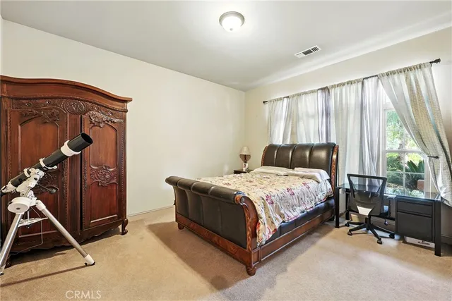 a view of yard with patio