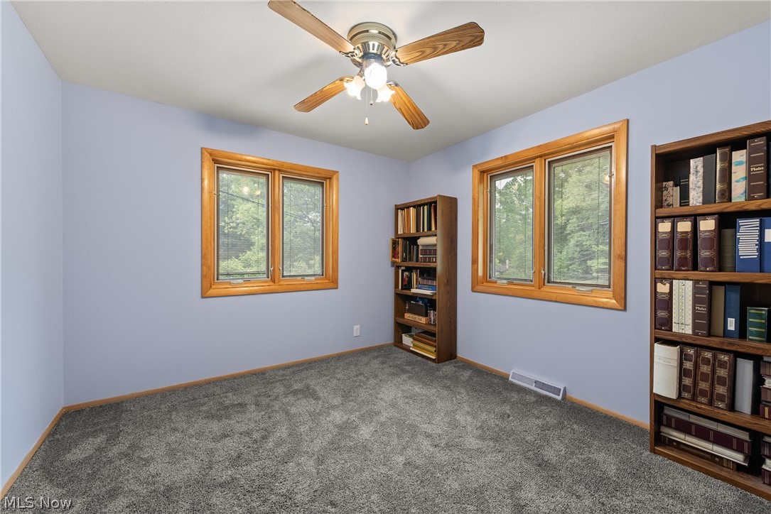1082 Ledgeview Road Macedonia, OH 44056 - Photo 21 of 47 Carpeted spare room with ceiling fan