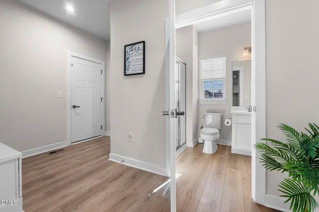 a view of entryway with wooden floor