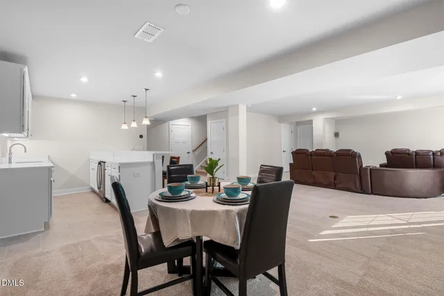 a view of a dining room with furniture