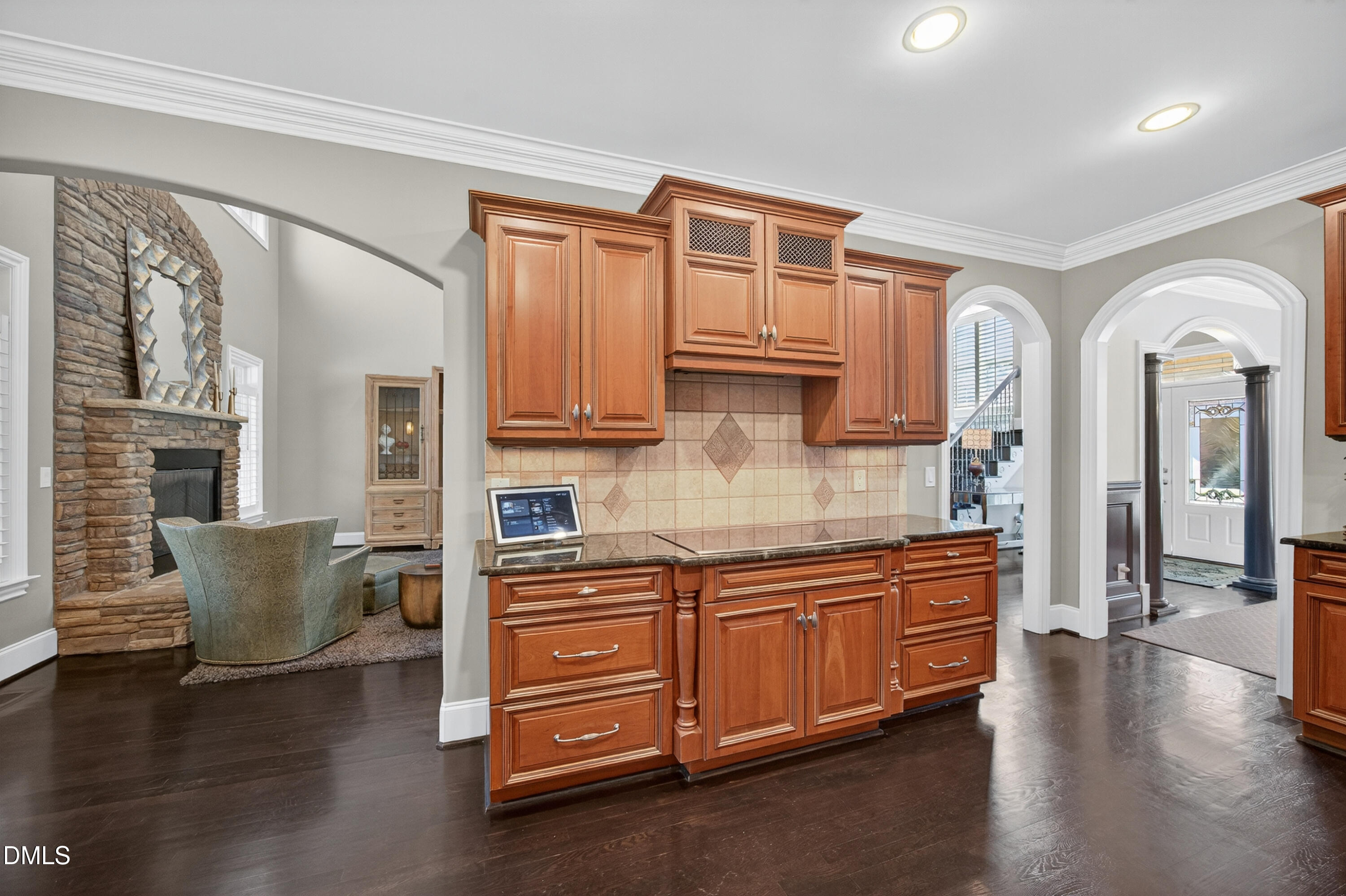 4900 Robdot Drive Oak Ridge, NC 27310 - Photo 13 of 58 a kitchen with stainless steel appliances granite countertop a sink and cabinets