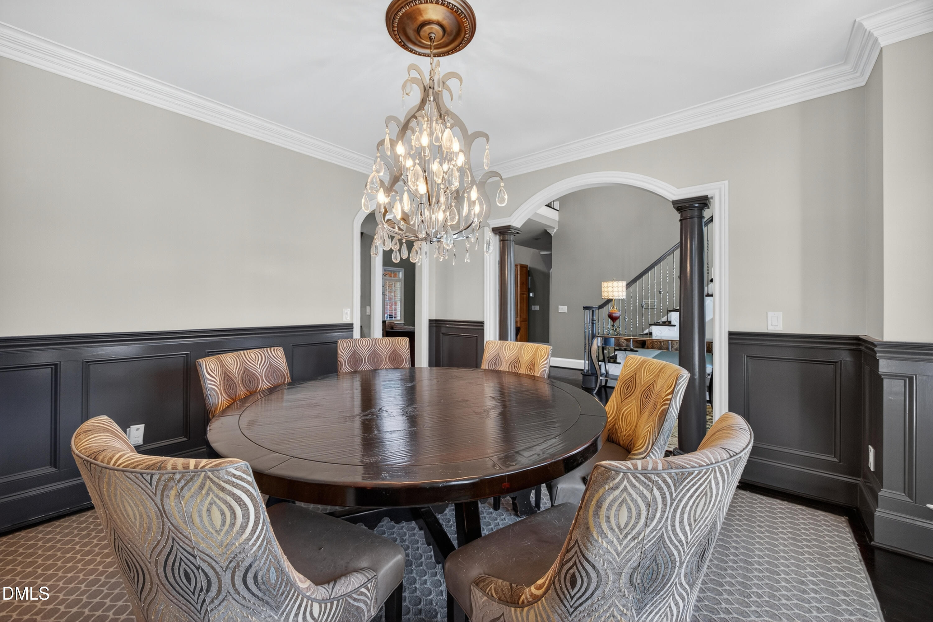 4900 Robdot Drive Oak Ridge, NC 27310 - Photo 19 of 58 a dining room with furniture a chandelier and window