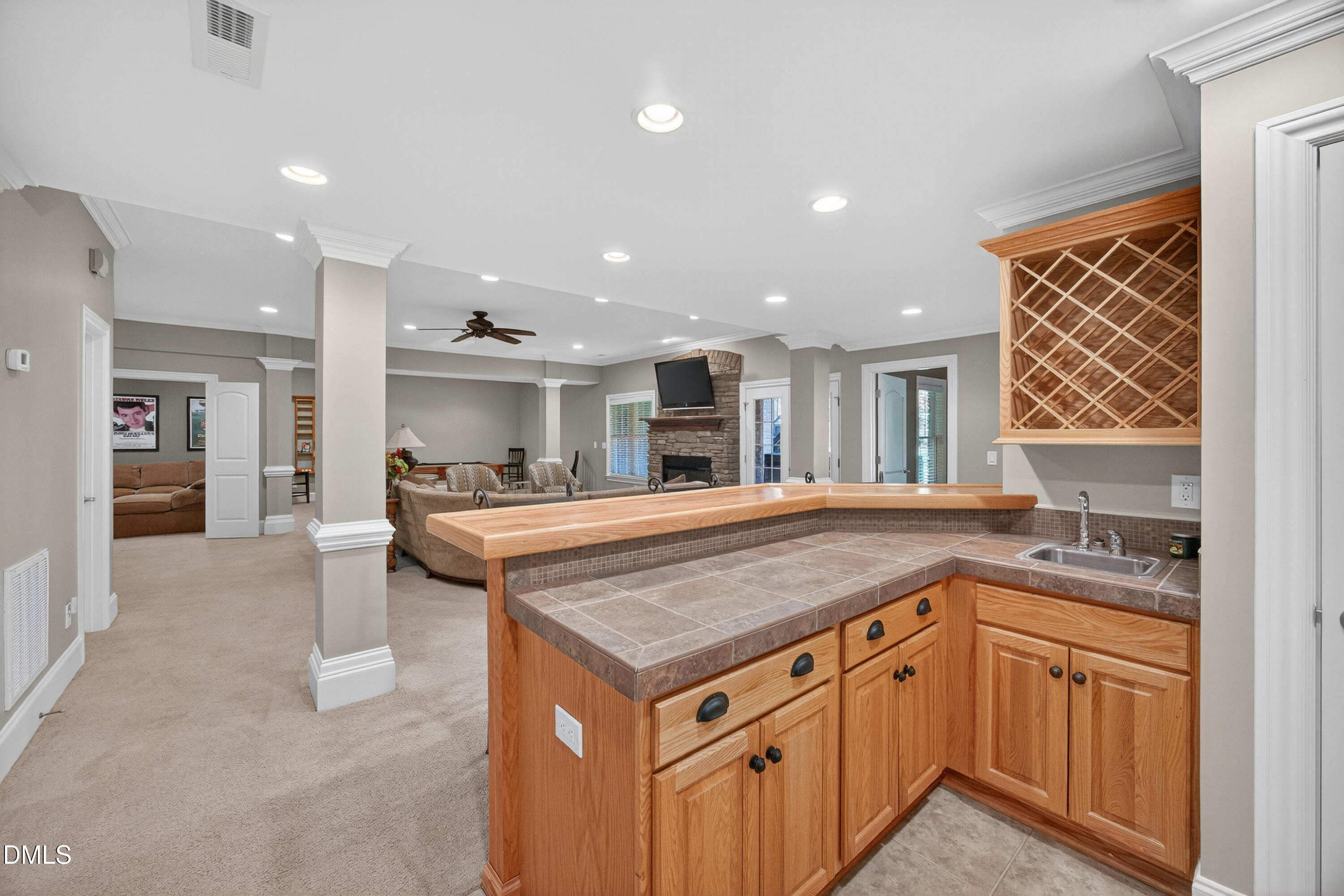 4900 Robdot Drive Oak Ridge, NC 27310 - Photo 39 of 58 a kitchen with a stove a sink and a refrigerator