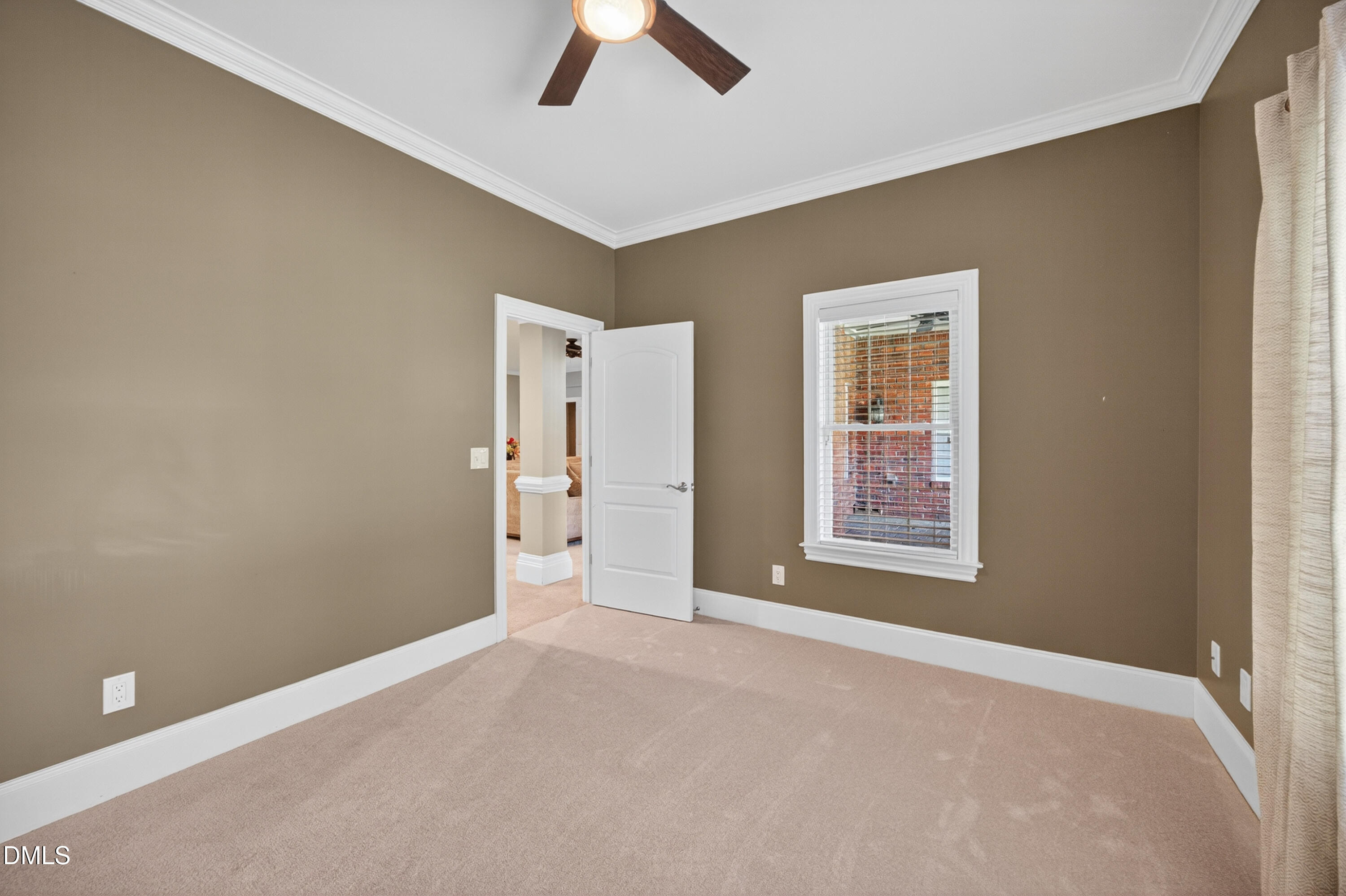 4900 Robdot Drive Oak Ridge, NC 27310 - Photo 41 of 58 a view of an empty room with a window
