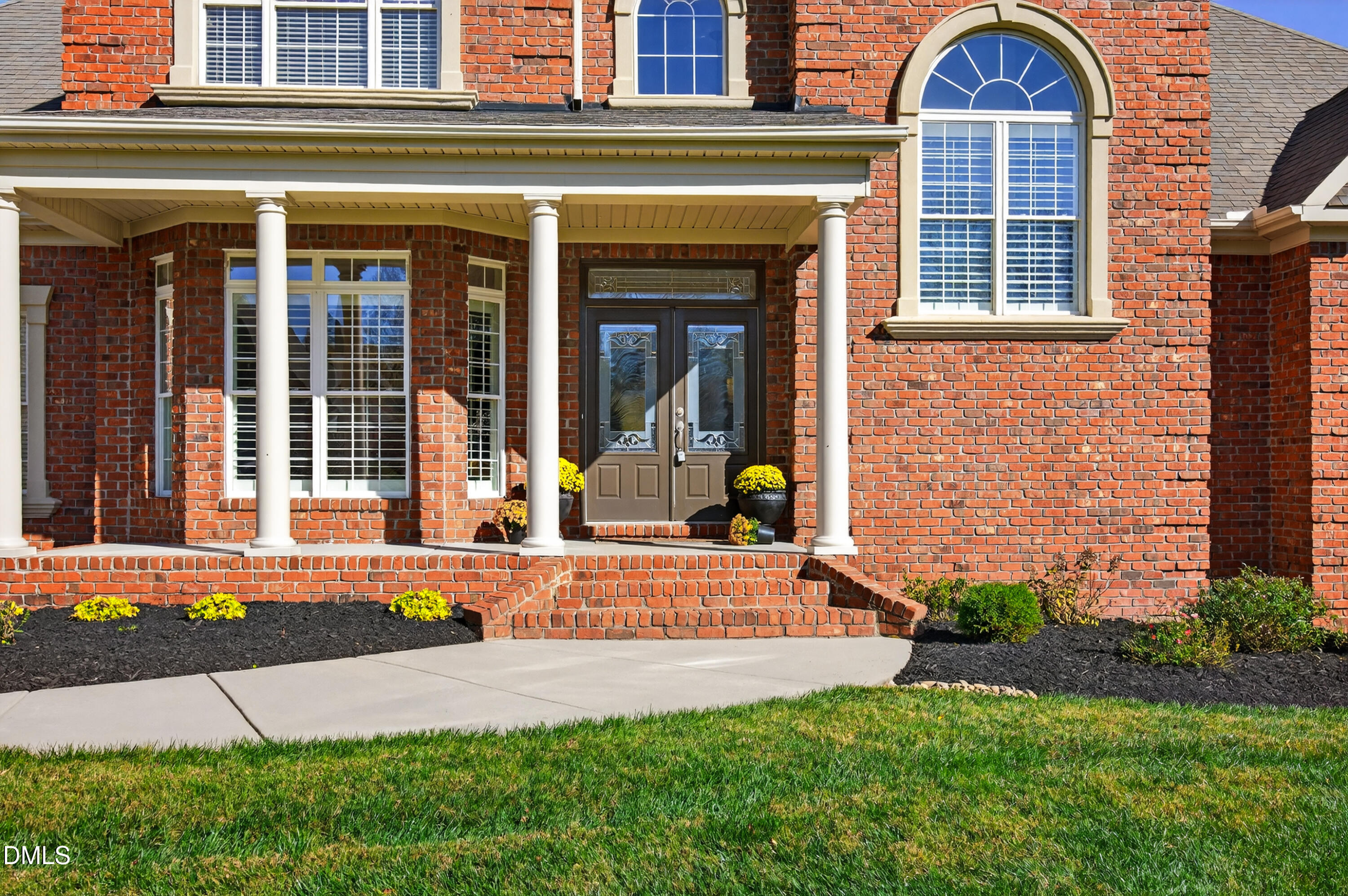 4900 Robdot Drive Oak Ridge, NC 27310 - Photo 5 of 58 front view of house with a pathway