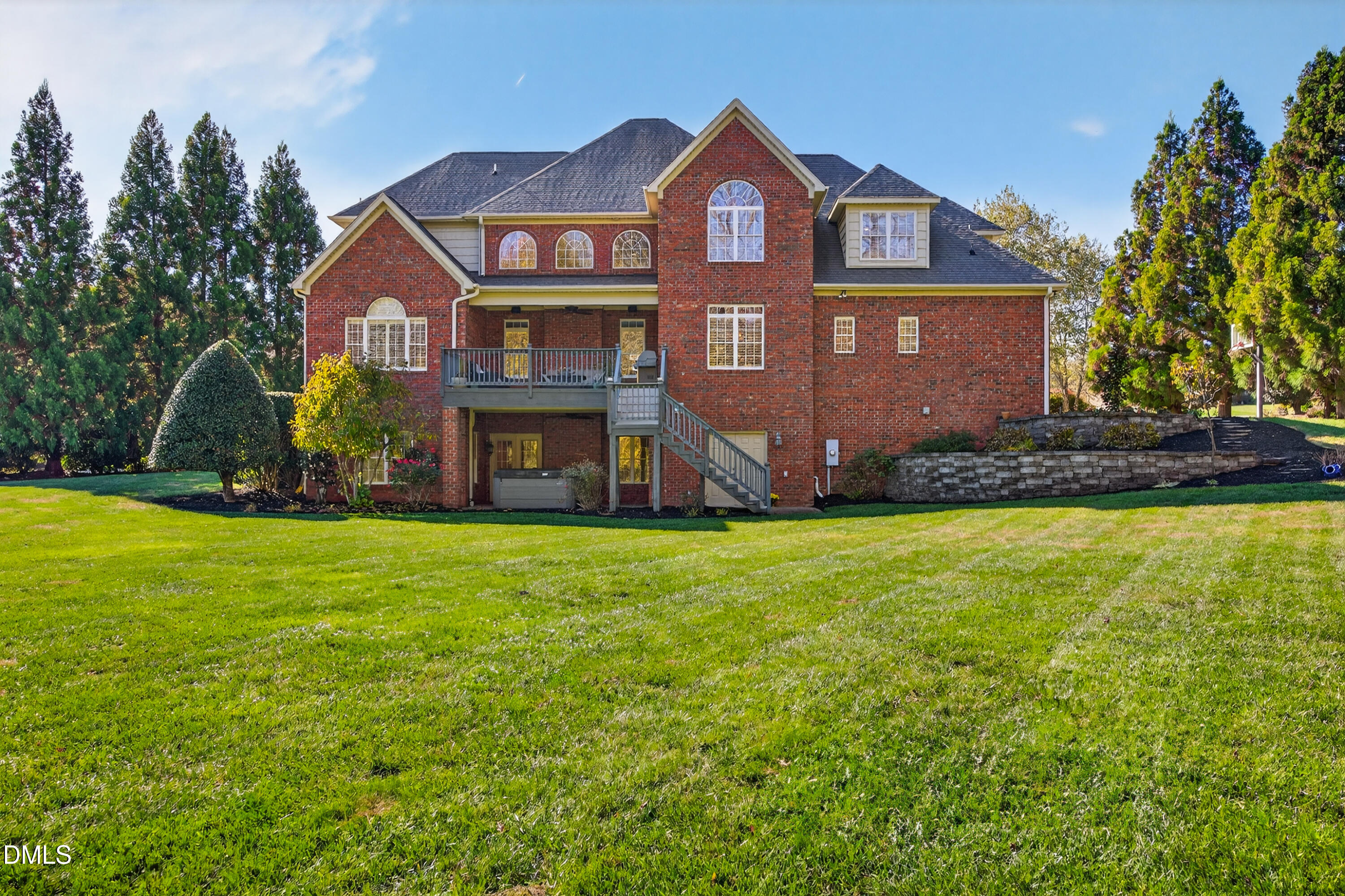 4900 Robdot Drive Oak Ridge, NC 27310 - Photo 53 of 58 a front view of a house with a yard