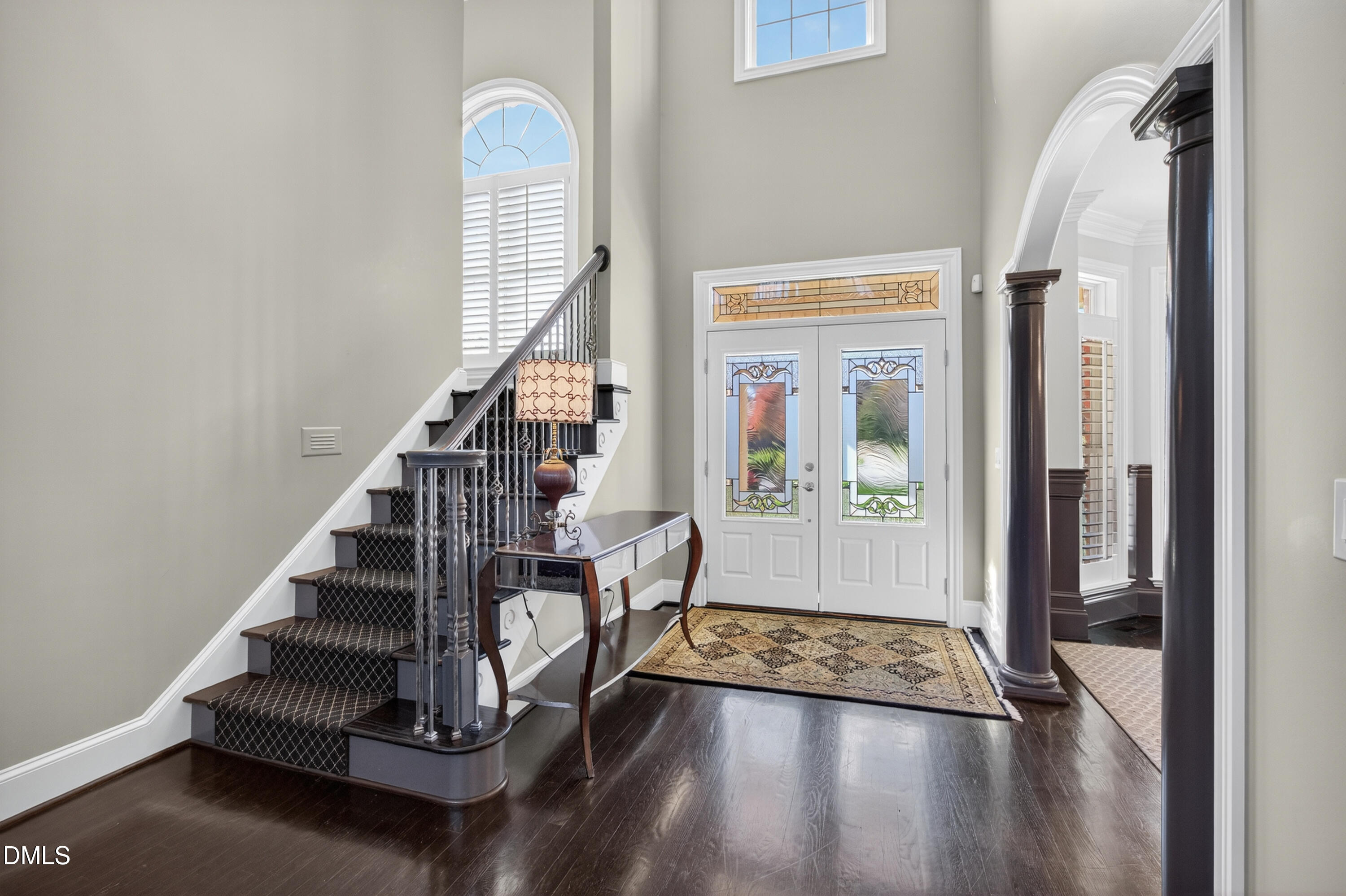 4900 Robdot Drive Oak Ridge, NC 27310 - Photo 6 of 58 a view of entryway with wooden floor and stairs