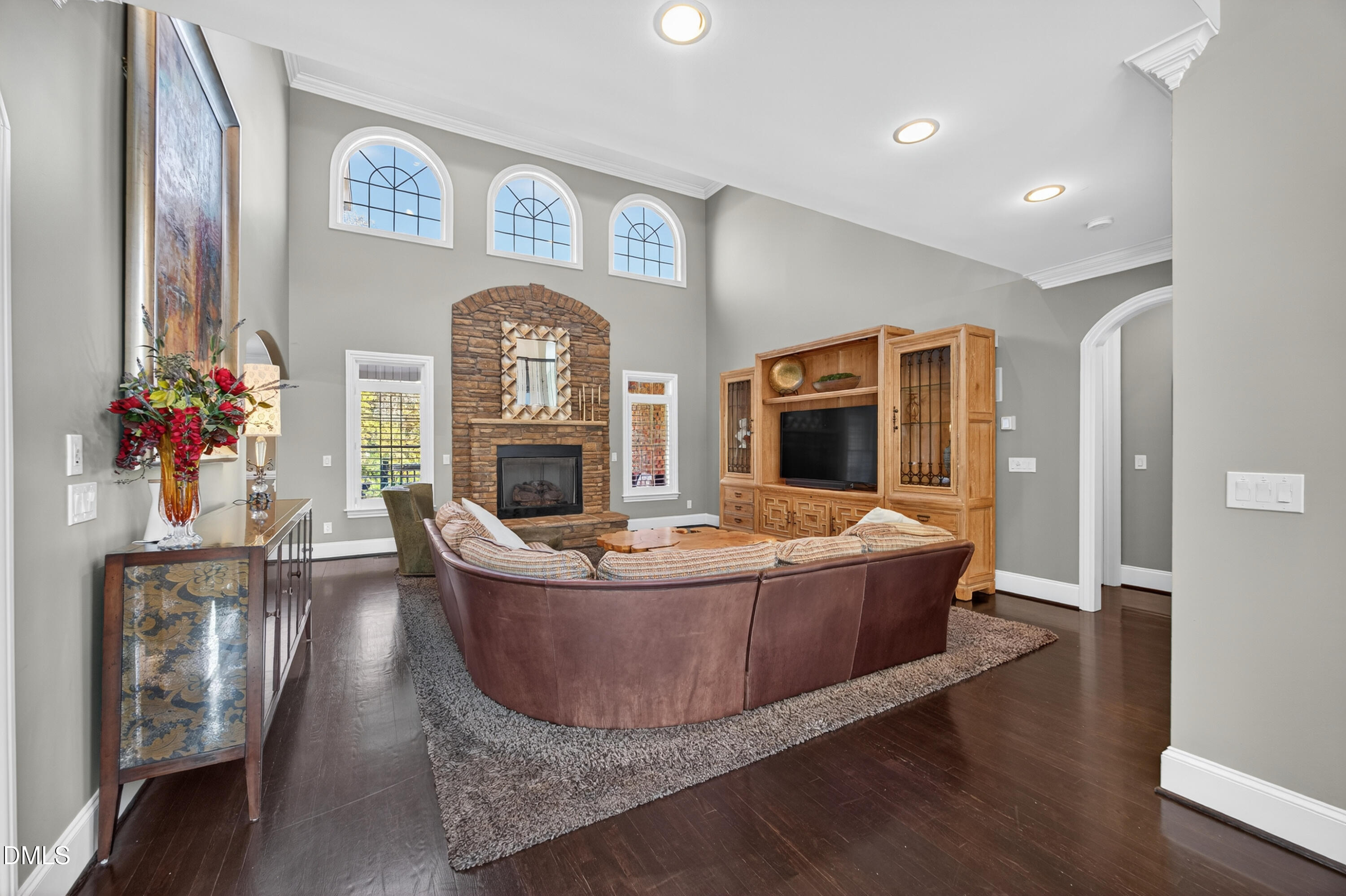 4900 Robdot Drive Oak Ridge, NC 27310 - Photo 8 of 58 a living room with furniture and a fireplace