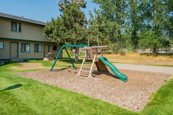 a view of a house with a park