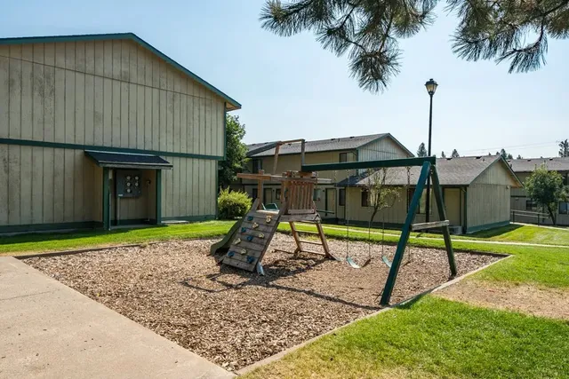 a house view with a garden space