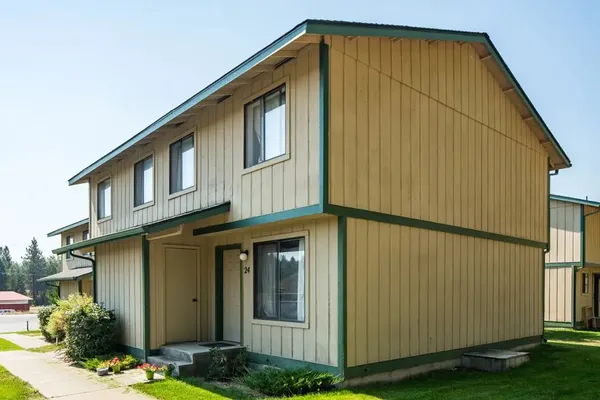 a front view of a house having yard