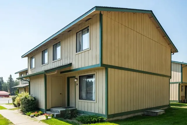 a front view of a house having yard