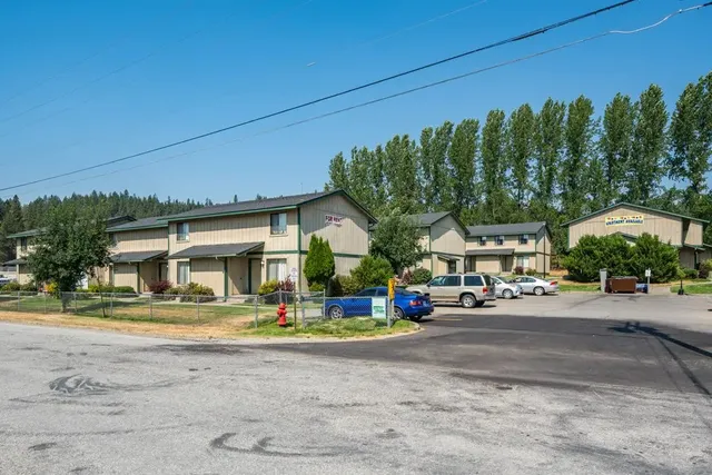 a front view of a building with garden