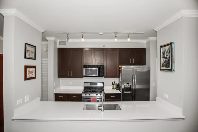 $399,900 | 3232 North Halsted Street, Unit H206, Chicago, IL 60657