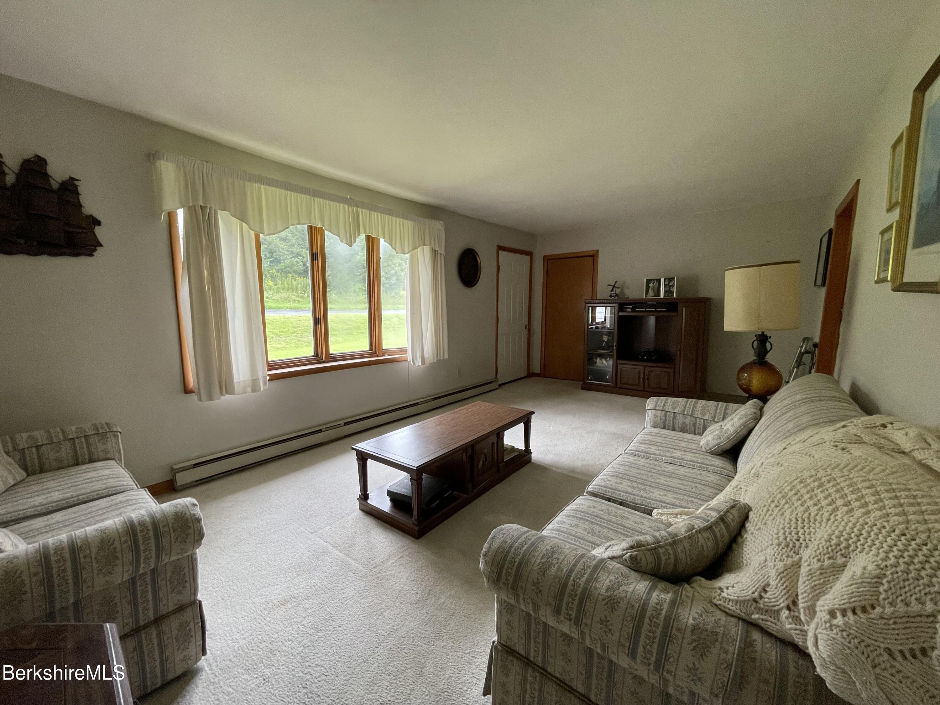 231 Central Shaft Road Florida, MA 01247 - Photo 11 of 21 a bedroom with furniture and a window
