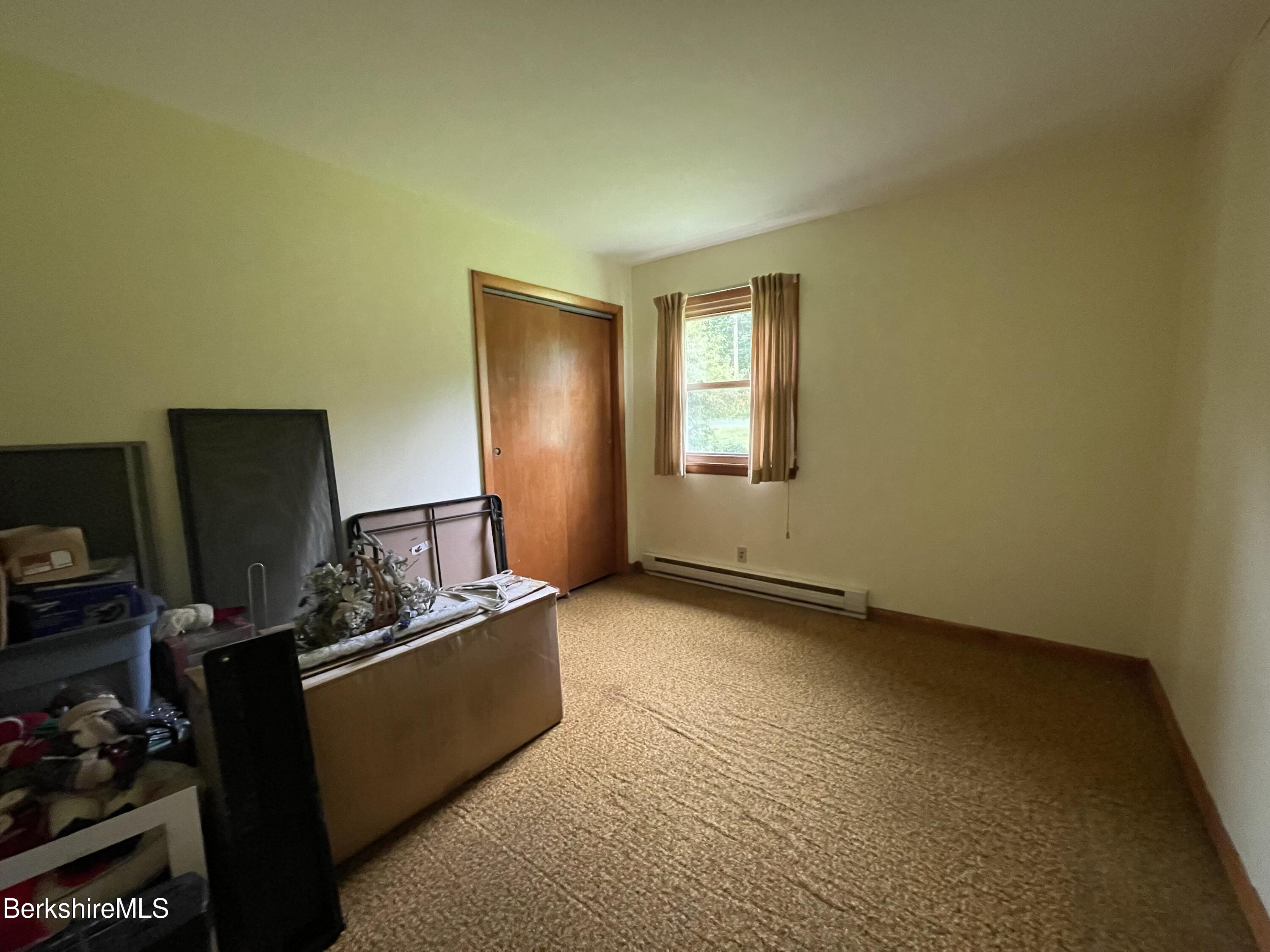 231 Central Shaft Road Florida, MA 01247 - Photo 12 of 21 a view of a livingroom with furniture and a window