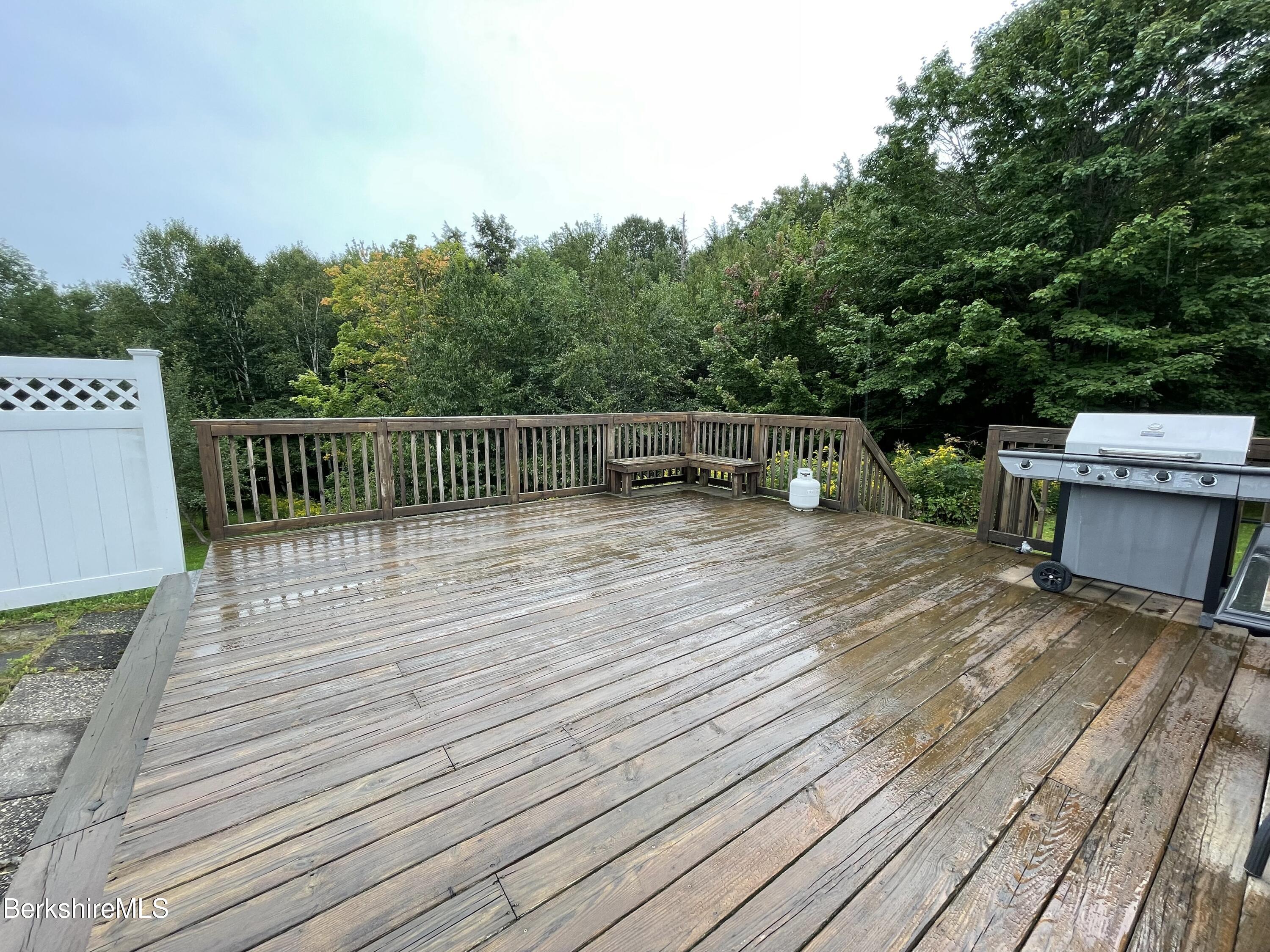 231 Central Shaft Road Florida, MA 01247 - Photo 16 of 21 a view of deck with wooden floor and seating space
