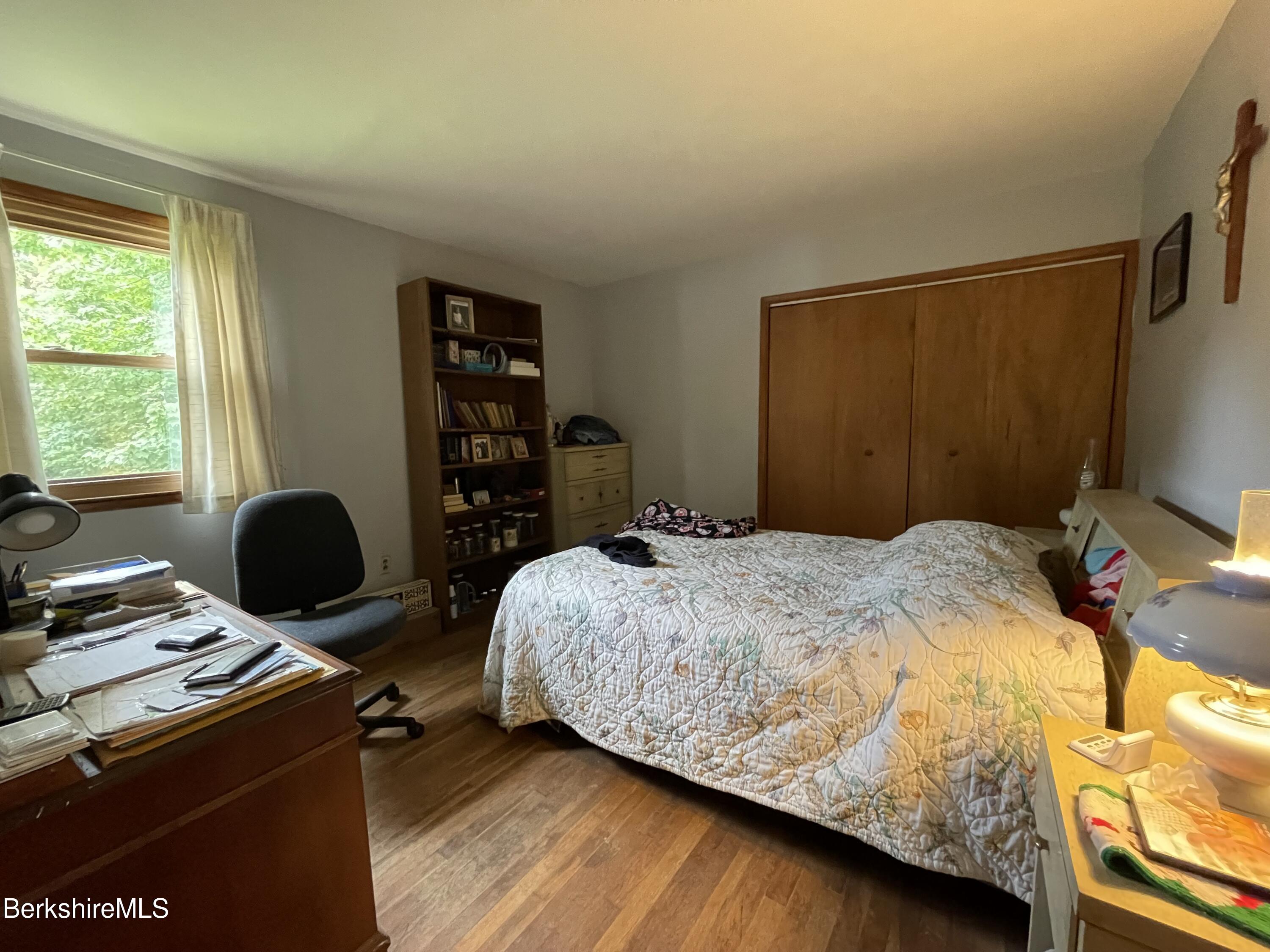 231 Central Shaft Road Florida, MA 01247 - Photo 10 of 21 a bedroom with a bed and a desk