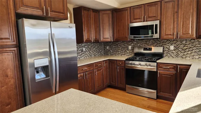 a view of a utility room with stairs