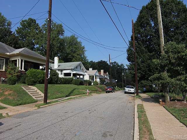 2215 Creston Road Raleigh, NC 27608 - Photo 14 of 14 a view of house with outdoor space and street view