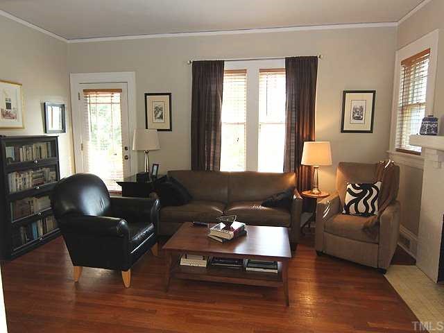 2215 Creston Road Raleigh, NC 27608 - Photo 4 of 14 a living room with furniture rug and window