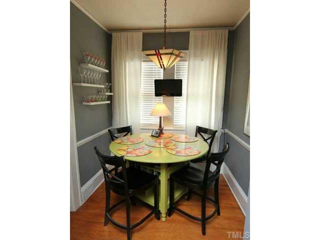 2215 Creston Road Raleigh, NC 27608 - Photo 8 of 14 a view of a room with a table and chairs