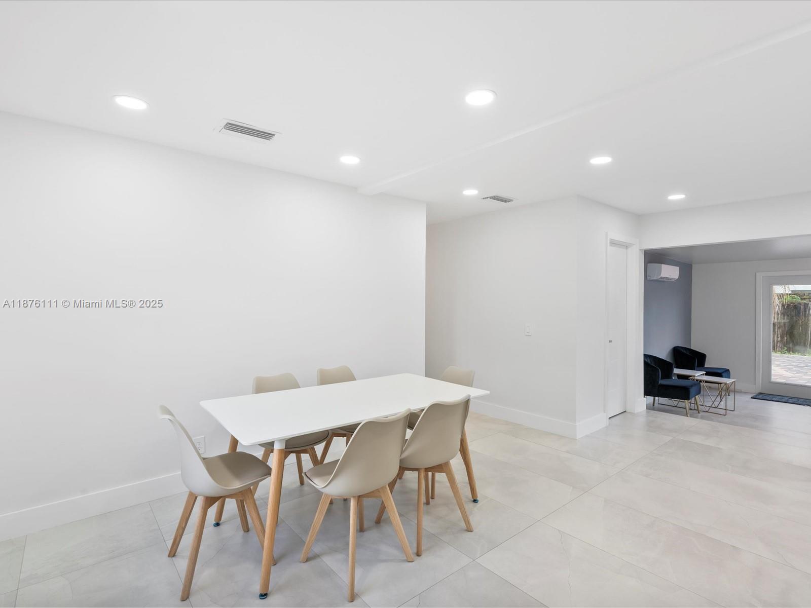 5731 Southwest 54th Terrace Davie, FL 33314 - Photo 10 of 22 a view of a dining room with furniture