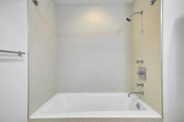a view of a bathroom with a glass door
