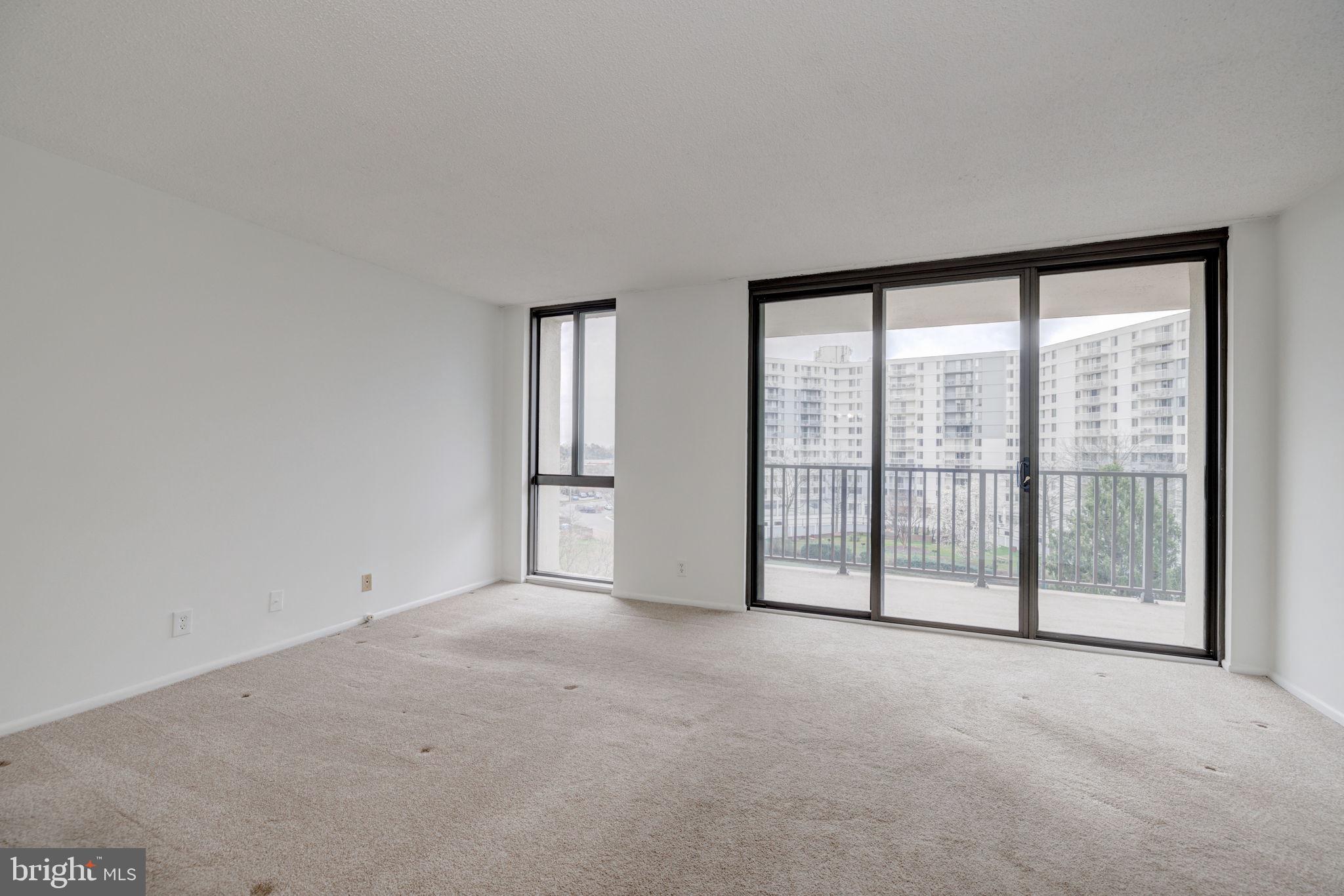 6800 Fleetwood Road, Unit 720 McLean, VA 22101 - Photo 13 of 28 Primary Bedroom w/ balcony access