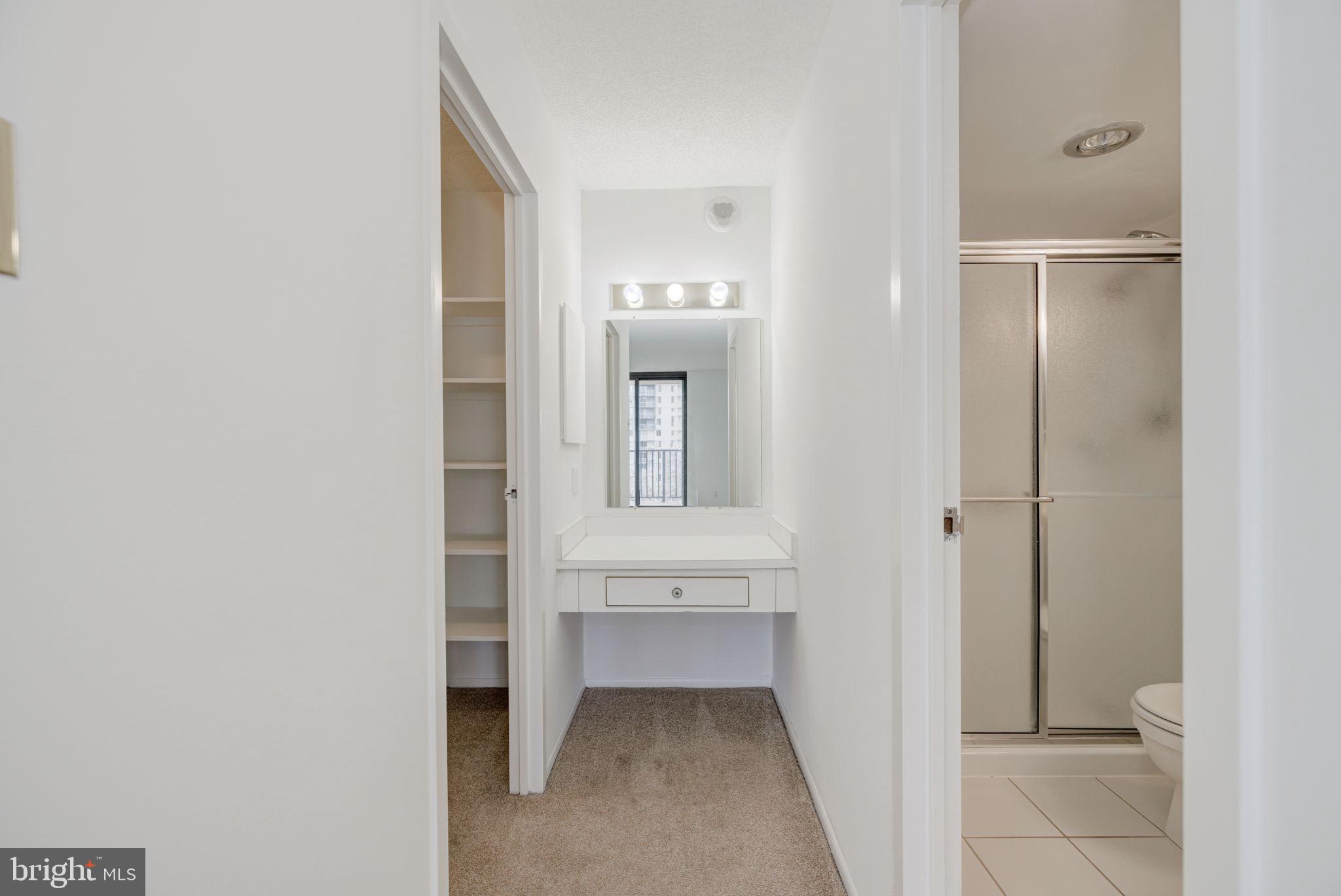 6800 Fleetwood Road, Unit 720 McLean, VA 22101 - Photo 15 of 28 Vanity Area leading to closet & en suite bath