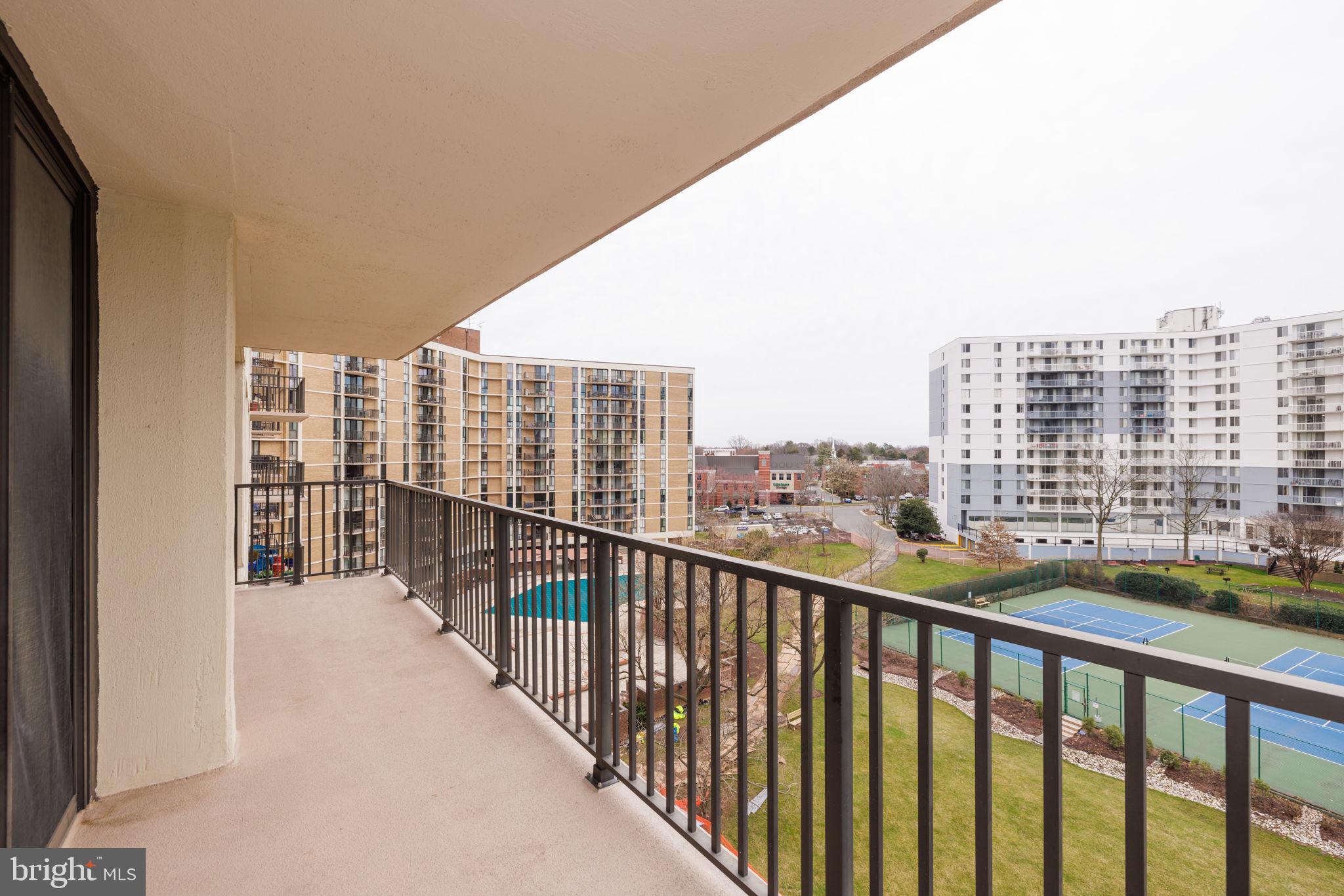 6800 Fleetwood Road, Unit 720 McLean, VA 22101 - Photo 9 of 28 Double Balcony overlooking Tennis Courts & Pool