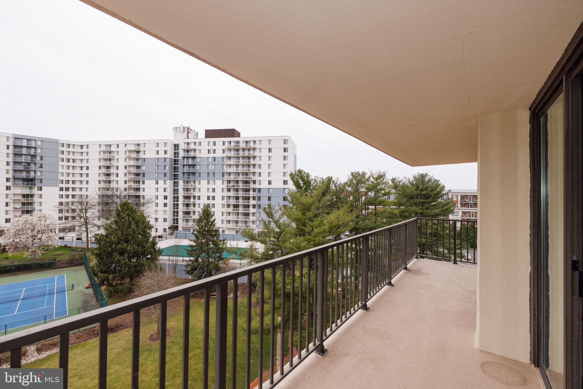 6800 Fleetwood Road, Unit 720 McLean, VA 22101 - Photo 10 of 28 Double Balcony overlooking Tennis Courts & Pool