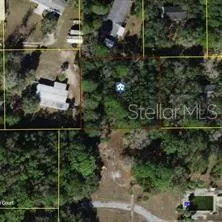 an aerial view of houses and roads