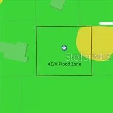 an aerial view of residential house with outdoor space